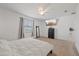 Bright bedroom with a ceiling fan and a media setup at 1050 Davis Heather Cir, Seffner, FL 33584