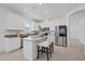Kitchen featuring stainless steel appliances, granite counters, and a central island at 1050 Davis Heather Cir, Seffner, FL 33584