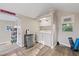Laundry room with washer, dryer, and a mini fridge with neutral walls and plank flooring at 108 S Lincoln Ave, Tampa, FL 33609