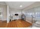 Comfortable sunroom featuring hardwood floors, neutral tones, and ample natural light at 108 S Lincoln Ave, Tampa, FL 33609
