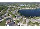 Aerial view of a residential area with lake access and lush green surroundings at 10810 Lakeside Vista Dr, Riverview, FL 33569