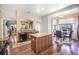 Bright eat-in kitchen area featuring granite counters and a breakfast nook with large windows at 10810 Lakeside Vista Dr, Riverview, FL 33569