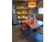 Cozy dining nook with hutch, hardwood table and chairs, and stylish decor at 1200 N Shore Ne Dr # 212, St Petersburg, FL 33701