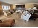 Elegant living room featuring plush seating, tile floors, and sophisticated decor at 1200 N Shore Ne Dr # 212, St Petersburg, FL 33701