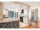 Stylish kitchen with granite counters, black appliances, and modern tile backsplash at 1366 Wexford N Dr, Palm Harbor, FL 34683