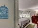 Comfortable bedroom with a cozy bed, neutral decor, and a relaxing ambiance at 14130 Rosemary Ln # 1201, Largo, FL 33774