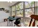 Charming Florida room with large windows, allowing natural light to fill the space at 14130 Rosemary Ln # 1201, Largo, FL 33774