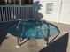 Relaxing in-ground hot tub featuring metal handrails and a white fence for privacy at 14130 Rosemary Ln # 1201, Largo, FL 33774