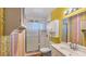A full bathroom includes a shower, toilet, sink, and vanity with storage at 1515 Arrowhead Dr, Sun City Center, FL 33573
