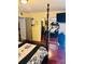 Comfortable main bedroom featuring a dark wooden bed and mirrored closet at 1516 Arrowhead Dr, Sun City Center, FL 33573
