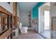 Bathroom under renovation with a toilet and shower and walls that have been torn apart at 1591 N Dakota Ne Ave, St Petersburg, FL 33703
