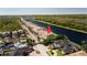 Desirable location with canal access and waterway views with nearby neighborhood amenities at 1806 Lago Vista Blvd, Palm Harbor, FL 34685