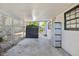 The carport provides covered parking and easy access to the backyard and house storage at 1908 E Mcberry St, Tampa, FL 33610