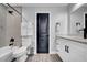Elegant bathroom boasts modern fixtures, sleek vanity, and stylish tile flooring at 20 2Nd Se Ave, Lutz, FL 33549