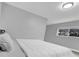 Bedroom with a view of the window and a cozy bed, perfect for a restful night's sleep at 20 2Nd Se Ave, Lutz, FL 33549