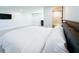 Bedroom with an ensuite bathroom featuring a shower/tub combo and gray vanity at 20 2Nd Se Ave, Lutz, FL 33549