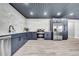 Kitchen with stainless steel appliances, light countertops, and marble backsplash at 20 2Nd Se Ave, Lutz, FL 33549