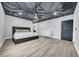 Spacious main bedroom features decorative ceiling, neutral walls, and modern flooring at 20 2Nd Se Ave, Lutz, FL 33549
