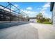 Large screened-in pool area with seating and mature trees, perfect for outdoor fun at 20 2Nd Se Ave, Lutz, FL 33549