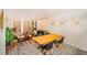 Open-concept living area with dining table, stylish decor, modern furniture and large windows for plenty of light at 220 Belleview Blvd # 701, Belleair, FL 33756