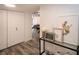 Stylish entryway with wood-look flooring, closet, and modern decor at 220 Belleview Blvd # 701, Belleair, FL 33756