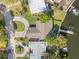 Aerial view of a single Gathering home featuring a dock on the water at 292 Sunlit Cove Ne Dr, St Petersburg, FL 33702