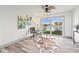 Bright office space with water views, a modern desk, and neutral color palette at 292 Sunlit Cove Ne Dr, St Petersburg, FL 33702