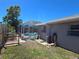 The backyard has a pool and outdoor recreation space at 3122 Egret Ter, Safety Harbor, FL 34695