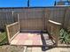 Small fenced area with a decorative brick surface at 3122 Egret Ter, Safety Harbor, FL 34695