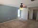 Spacious bedroom with a neutral color scheme, carpet flooring, ceiling fan and natural light at 3122 Egret Ter, Safety Harbor, FL 34695