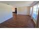 Inviting living room offers natural light and wood-look floors at 3122 Egret Ter, Safety Harbor, FL 34695