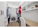 Walk-in closet features lots of shelving, hanging space, built-in drawers, and a desk at 315 64Th St, Holmes Beach, FL 34217