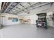 Spacious garage featuring epoxy floors, storage solutions, and room for a golf cart and a bicycle at 315 64Th St, Holmes Beach, FL 34217