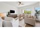 Comfortable living room with white walls, modern furniture, and ample natural light at 315 64Th St, Holmes Beach, FL 34217