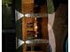 Outdoor patio featuring a fire pit, ample seating, and ambient lighting for evening relaxation and entertainment at 315 64Th St, Holmes Beach, FL 34217