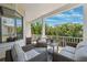 Spacious porch featuring comfortable seating and views of lush foliage at 315 64Th St, Holmes Beach, FL 34217