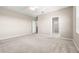 Large carpeted bedroom with ceiling fan, ensuite bathroom, and walk-in closet providing ample space at 34024 White Fountain Ct, Wesley Chapel, FL 33545