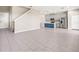 Open floor plan featuring modern kitchen and tile flooring at 34024 White Fountain Ct, Wesley Chapel, FL 33545