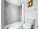 Clean bathroom features a tiled shower, new fixtures, and nautical decor at 39650 Us Highway 19 N # 411, Tarpon Springs, FL 34689