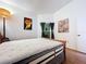 Bedroom with wood floors, natural light, and modern decor at 39650 Us Highway 19 N # 411, Tarpon Springs, FL 34689