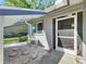 Cozy patio with neutral colors, providing a relaxing place to enjoy the outdoors at 39650 Us Highway 19 N # 411, Tarpon Springs, FL 34689