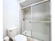 Modern shower stall with glass doors, updated fixtures, and tiled walls for a clean and stylish bathroom at 39650 Us Highway 19 N # 411, Tarpon Springs, FL 34689