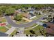Aerial view of a home with a screened pool in a quiet neighborhood at 4219 Summerdale Dr, Tampa, FL 33624