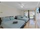 Bright bedroom area that opens up to a pool outside at 4219 Summerdale Dr, Tampa, FL 33624