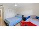 Bedroom featuring two beds, a ceiling fan, and closet at 4219 Summerdale Dr, Tampa, FL 33624