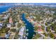 Extensive neighborhood aerial view showcasing proximity to waterway and downtown skyline at 44 Martinique Ave, Tampa, FL 33606