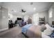 Spacious bedroom featuring a ceiling fan, seating area, and ample storage at 44 Martinique Ave, Tampa, FL 33606