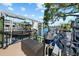 Home featuring a boat lift, dock, and waterfront access at 44 Martinique Ave, Tampa, FL 33606