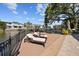 Waterfront property with a private dock and outdoor seating area at 44 Martinique Ave, Tampa, FL 33606