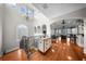 Open foyer with tall ceilings, hardwood floors, and wrought iron railing at 44 Martinique Ave, Tampa, FL 33606